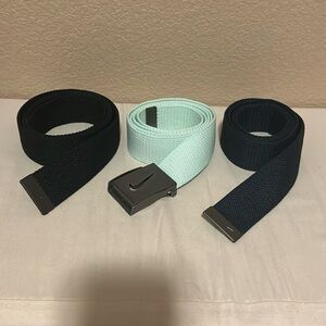 Three interchangeable Nike belts